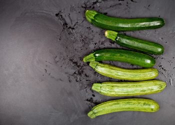 A group of cucumbers sitting on top of a table