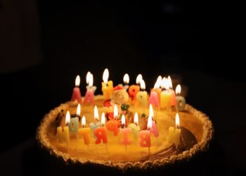 white icing Happy Birthday cake